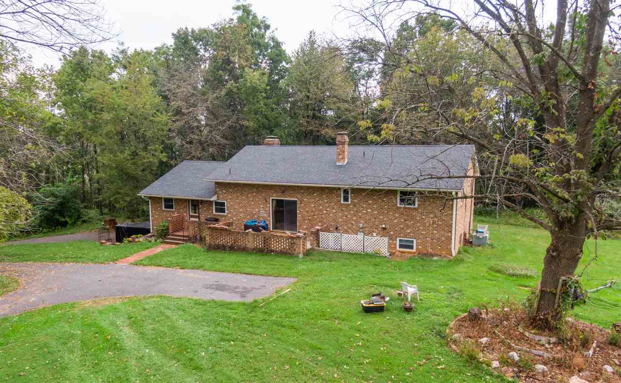 1959 Shutterlee Mill Road Staunton, VA 24401 - Photo 32 of 50 a view of a house with a yard and sitting area