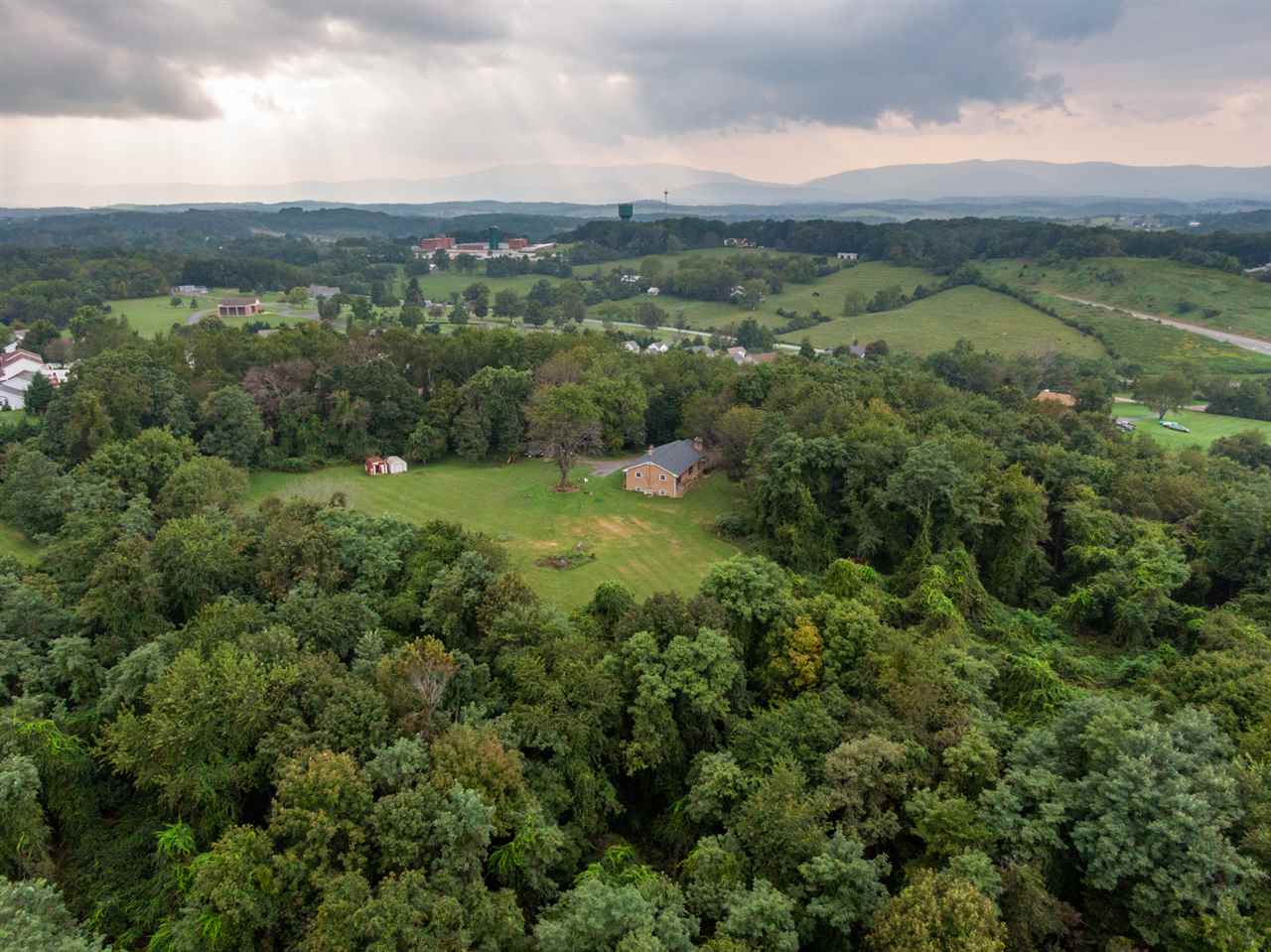 1959 Shutterlee Mill Road Staunton, VA 24401 - Photo 35 of 50 an aerial view of residential houses with outdoor space and trees