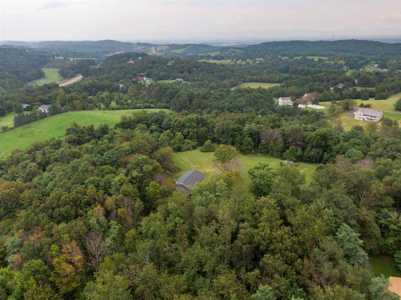 1959 Shutterlee Mill Road Staunton, VA 24401 - Photo 41 of 50 an aerial view of residential houses with outdoor space and trees
