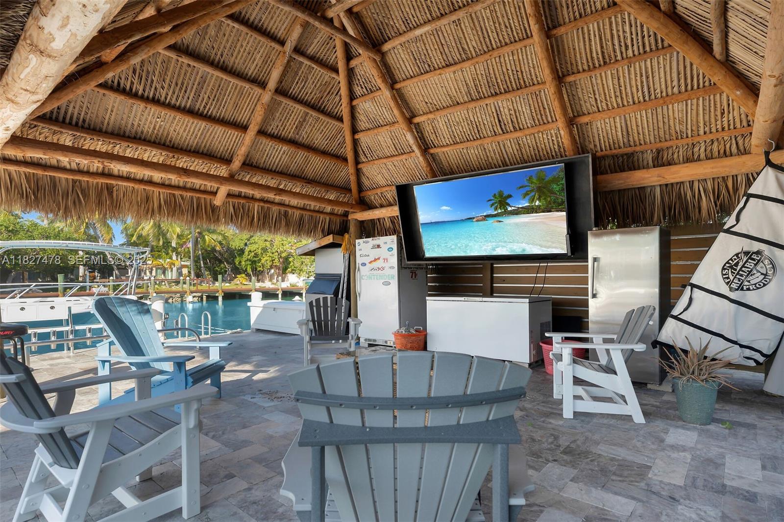 232 West Seaview Drive Marathon, FL 33050 - Photo 15 of 72 a view of a tables and chairs in patio