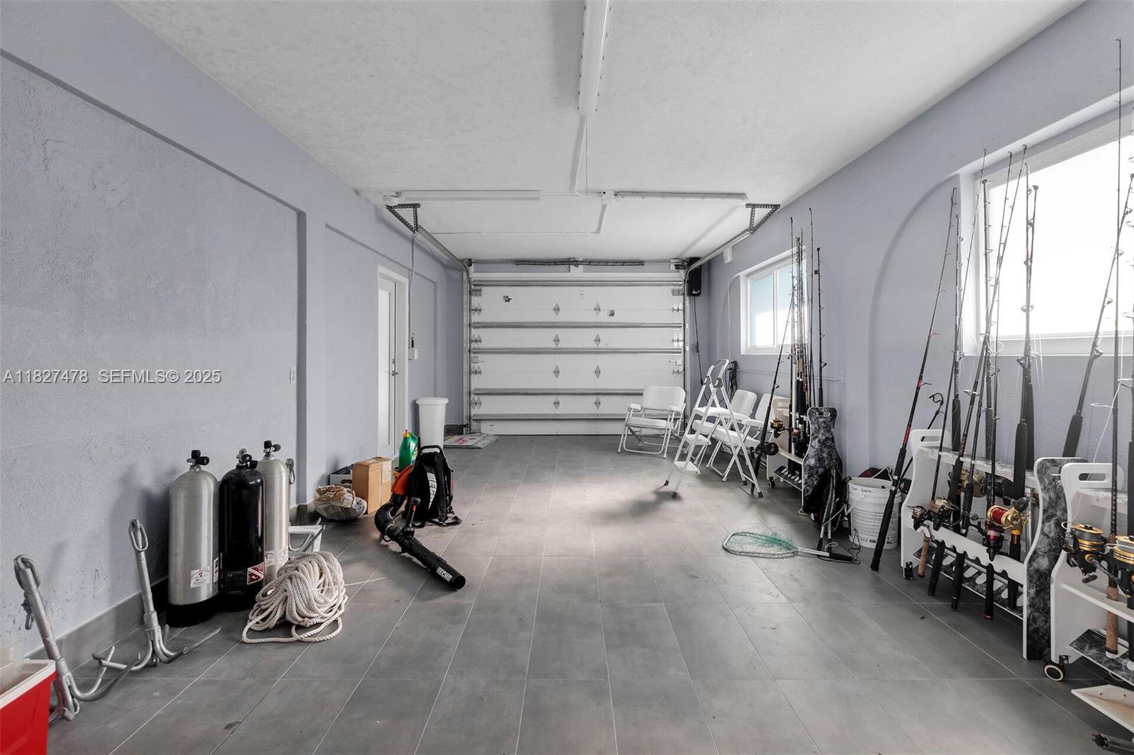 232 West Seaview Drive Marathon, FL 33050 - Photo 23 of 72 a view of a room with gym equipment