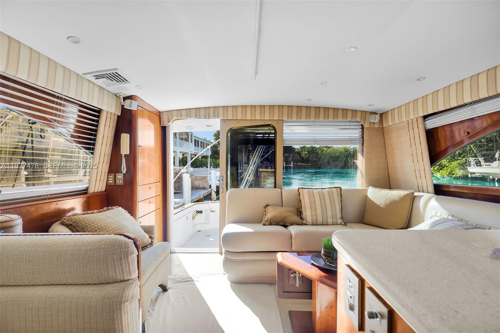 232 West Seaview Drive Marathon, FL 33050 - Photo 64 of 72 a living room with furniture and a large window