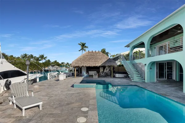a view of a house with swimming pool