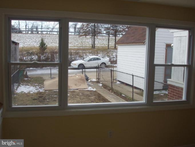 2777 Yarnall Road Halethorpe, MD 21227 - Photo 21 of 23 a view of a glass door with a view of balcony