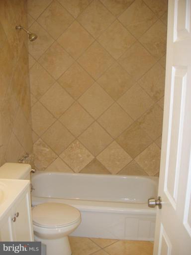 2777 Yarnall Road Halethorpe, MD 21227 - Photo 10 of 23 a bathroom with a toilet and a shower