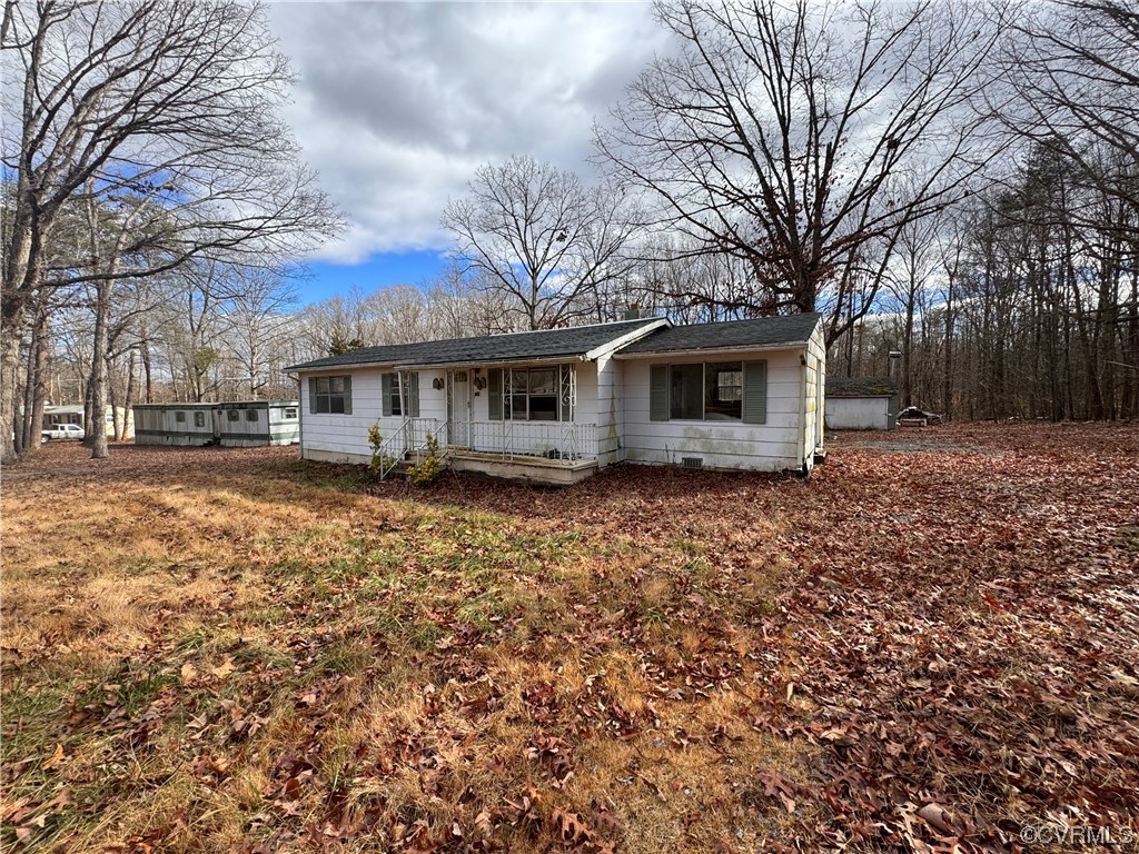738 Roundabout Road Louisa, VA 23093 - Photo 7 of 9 a front view of a house with a yard