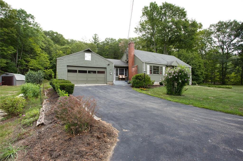 318 North Windham Road Windham, CT 06256 - Photo 1 of 1 a front view of a house with a yard
