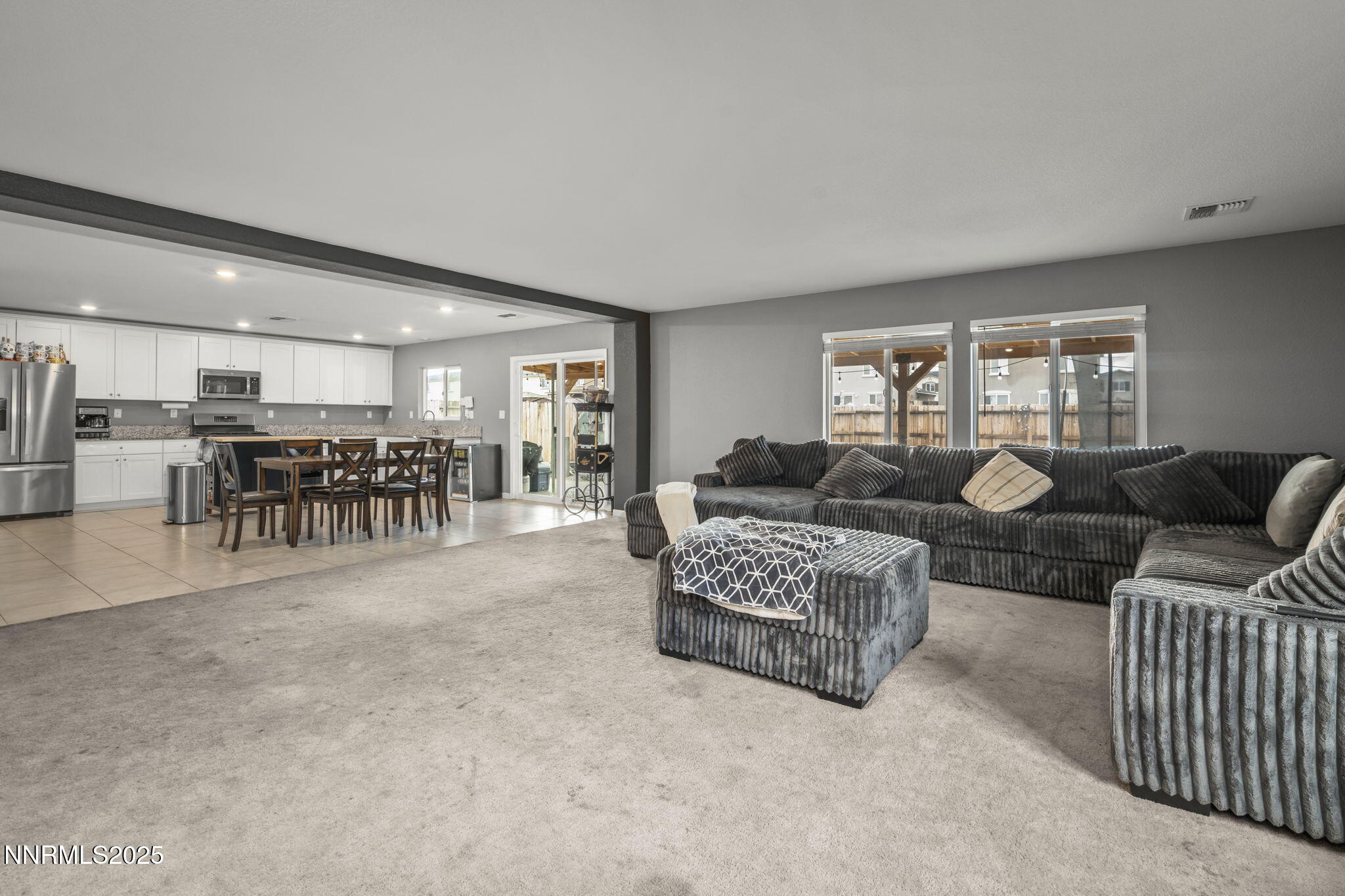 8961 Buffalo Grove Drive Reno, NV 89506 - Photo 11 of 23 a living room with furniture and a table