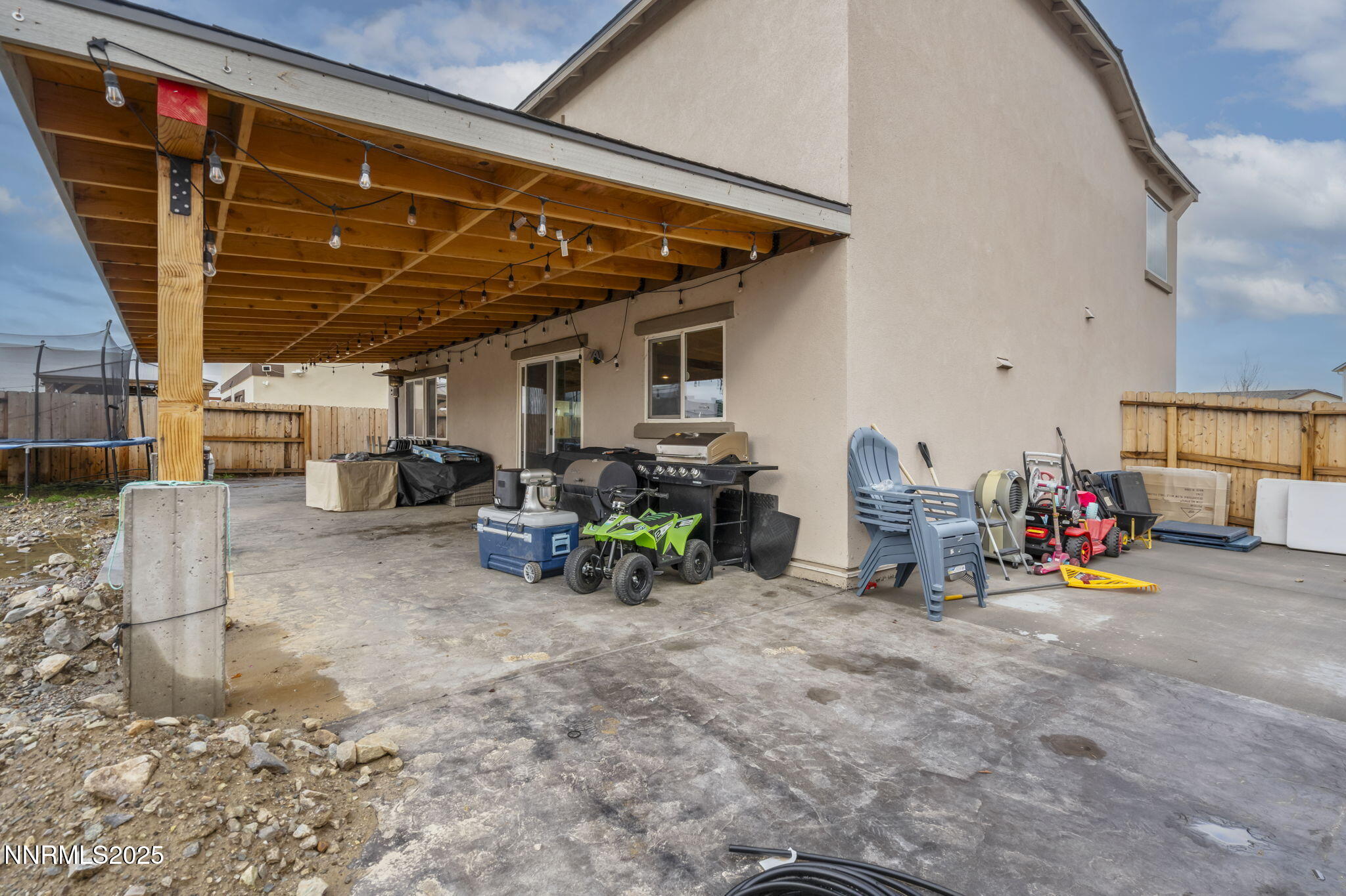 8961 Buffalo Grove Drive Reno, NV 89506 - Photo 22 of 23 a view of a garage with parked cars