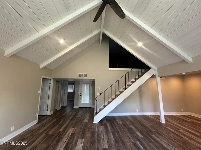 a view of entryway with wooden floor