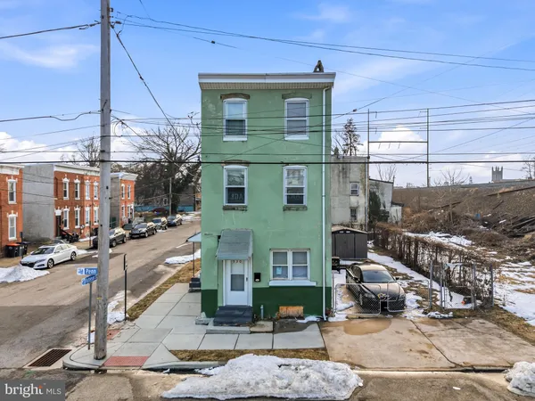 a view of a building with sitting area