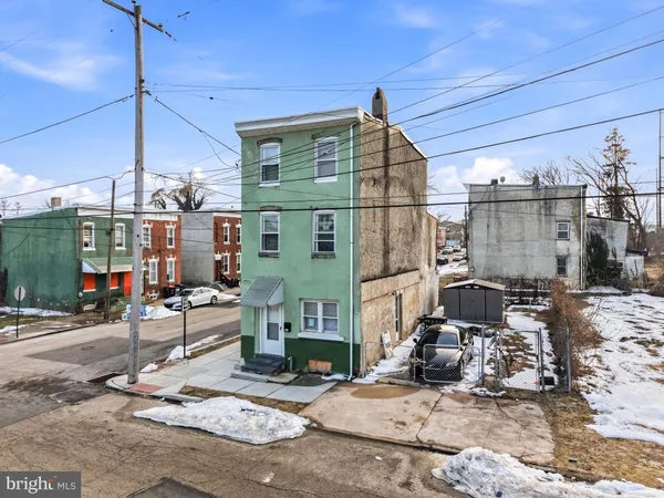 a view of a street with sitting area