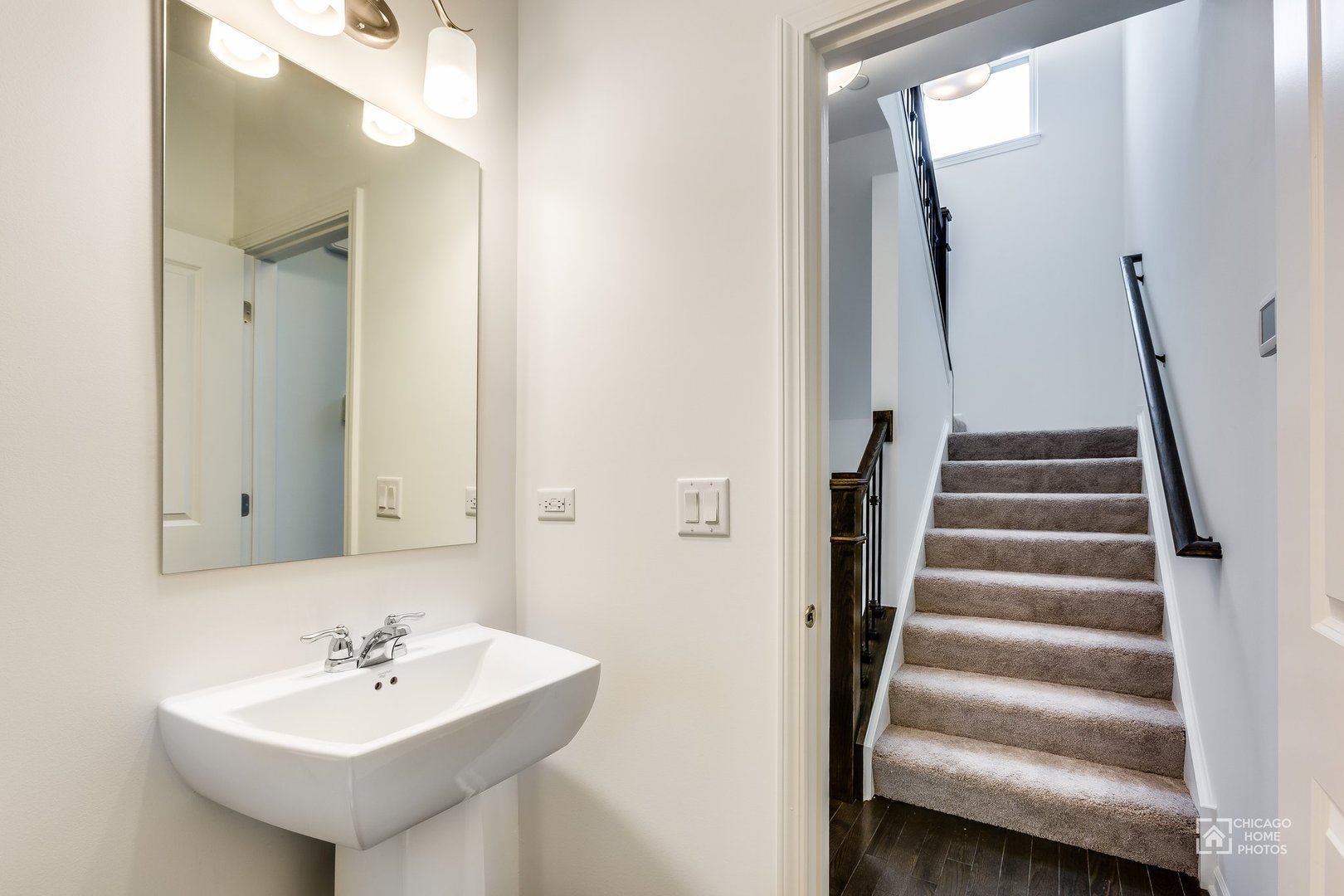 1206 Elm Street Park Ridge, IL 60068 - Photo 18 of 26 a bathroom with a sink and a mirror