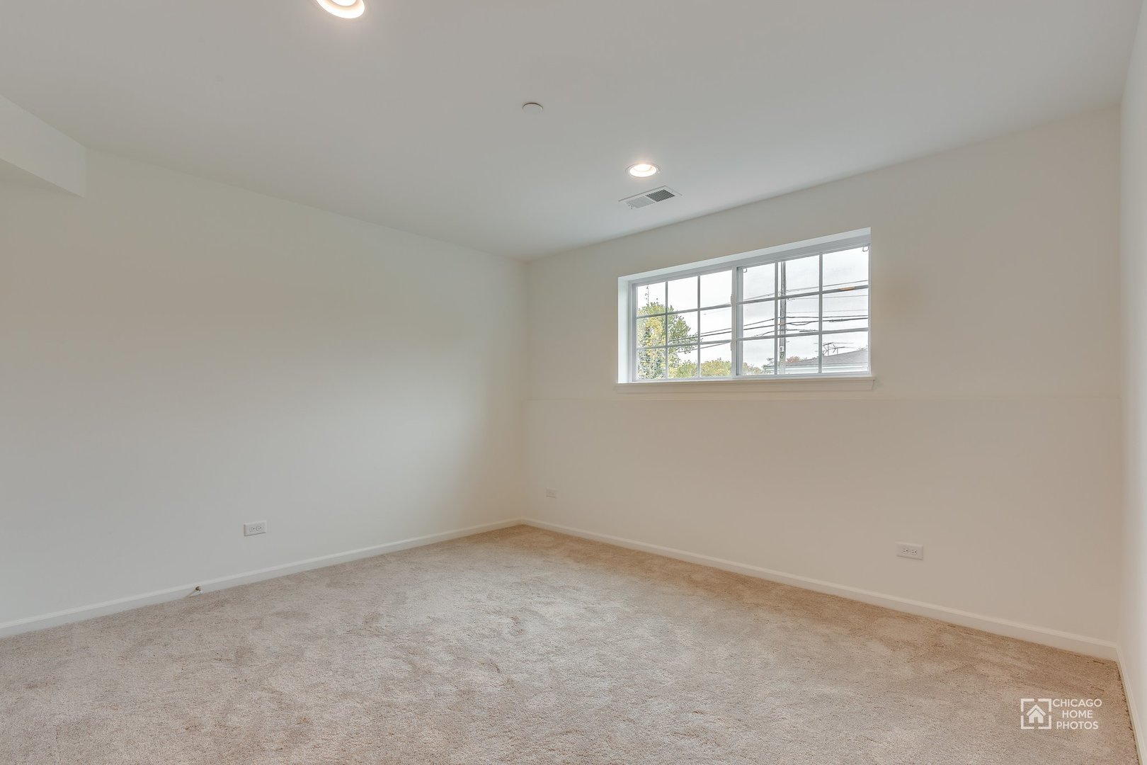 1206 Elm Street Park Ridge, IL 60068 - Photo 20 of 26 an empty room with windows