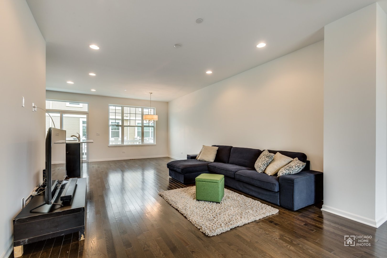 1206 Elm Street Park Ridge, IL 60068 - Photo 2 of 26 a living room with furniture and a flat screen tv