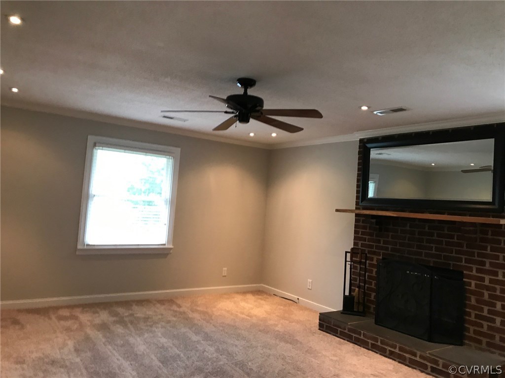 9708 Esmont Road Henrico, VA 23228 - Photo 12 of 19 GREAT SIZED FAMILY ROOM WITH WOOD BURNING FIREPLAC