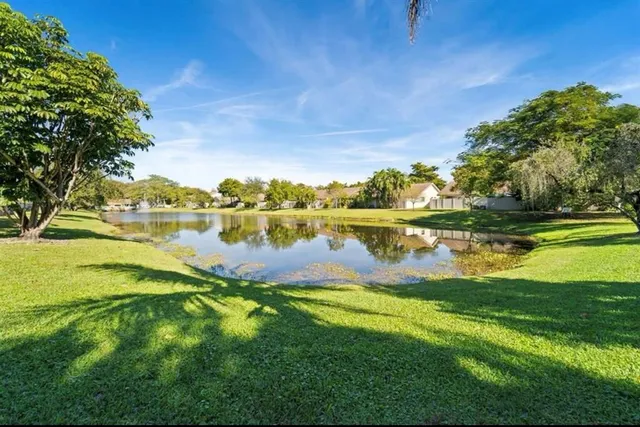 a view of a lake with houses