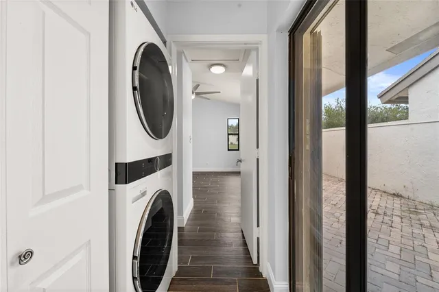 a view of a swimming pool and lounge chairs