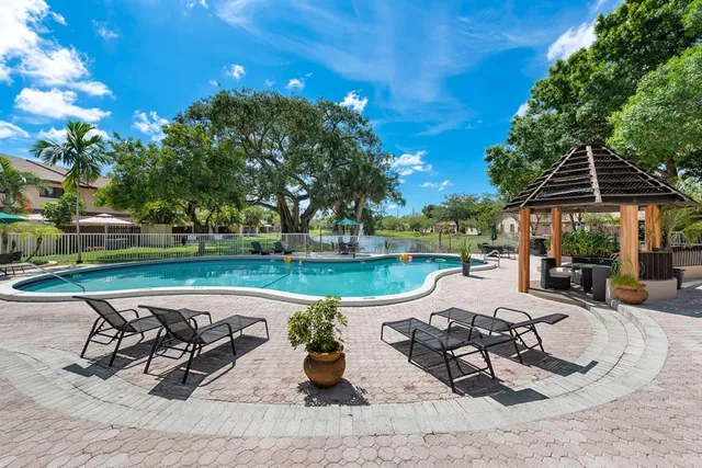 a view of a house with swimming pool