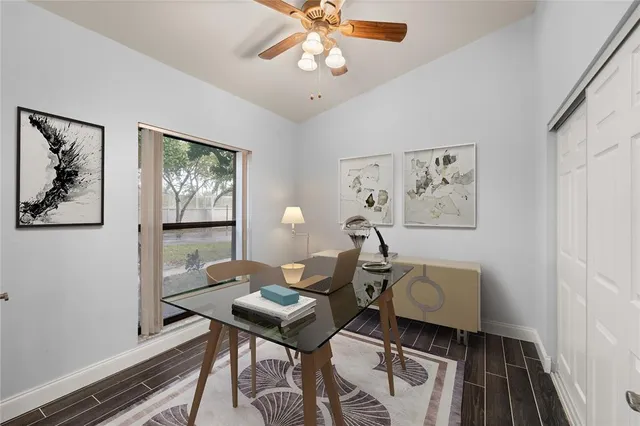 a view of a workspace with furniture