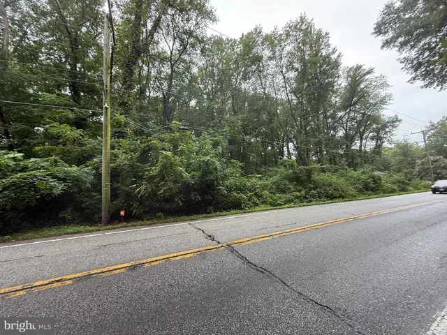 a view of a bench in a parking space