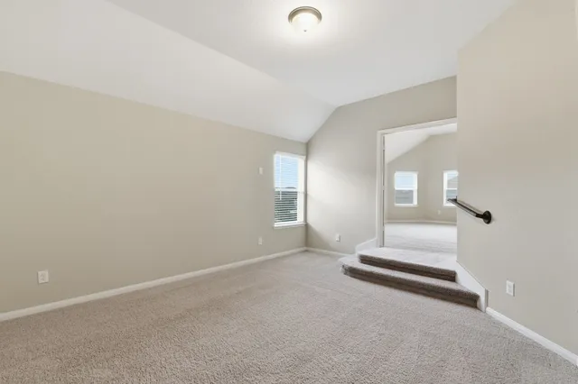 a view of livingroom and kitchen with sink