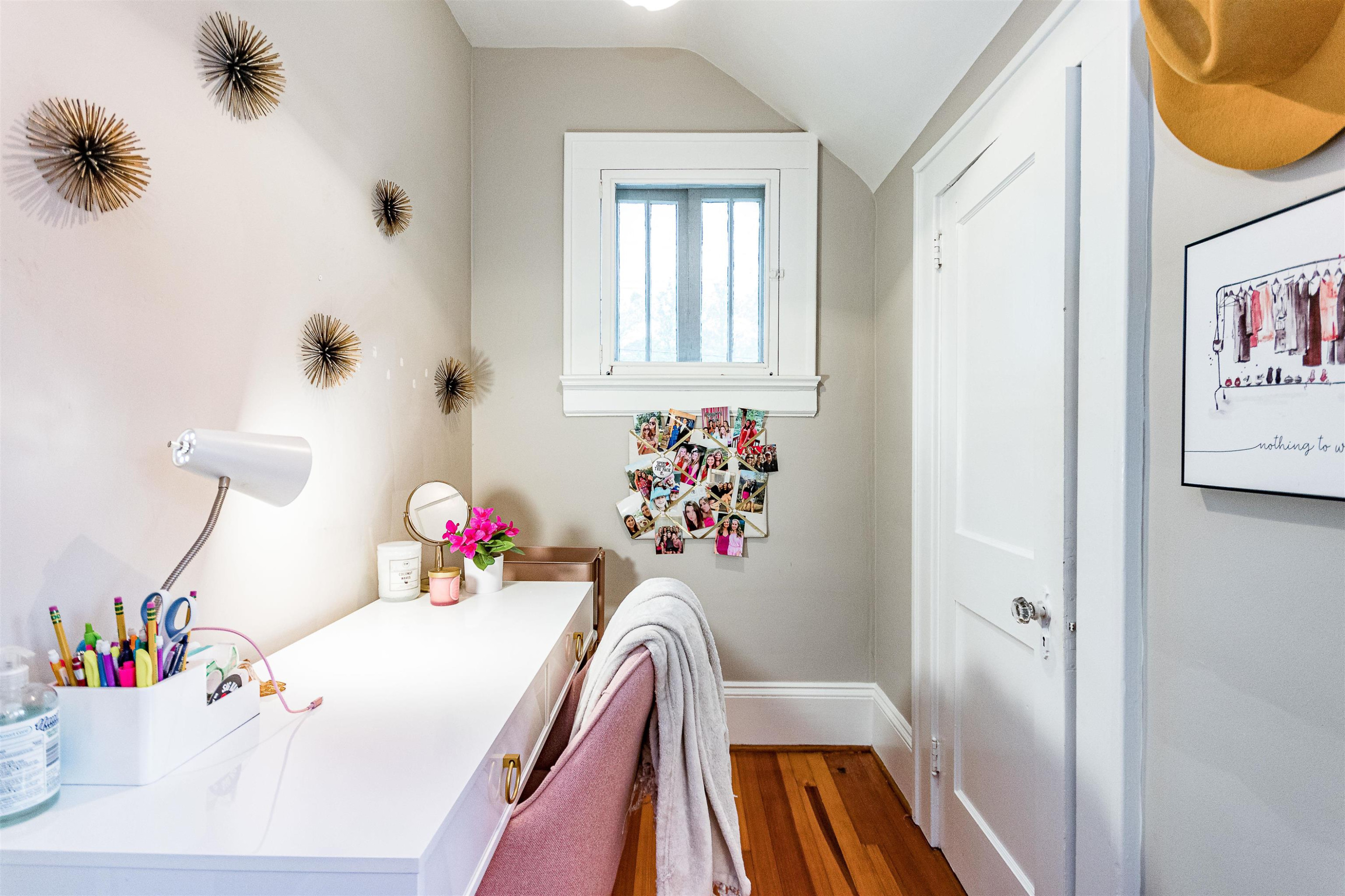 618 Brooks Avenue Raleigh, NC 27607 - Photo 15 of 27 a bedroom with a bed and a table