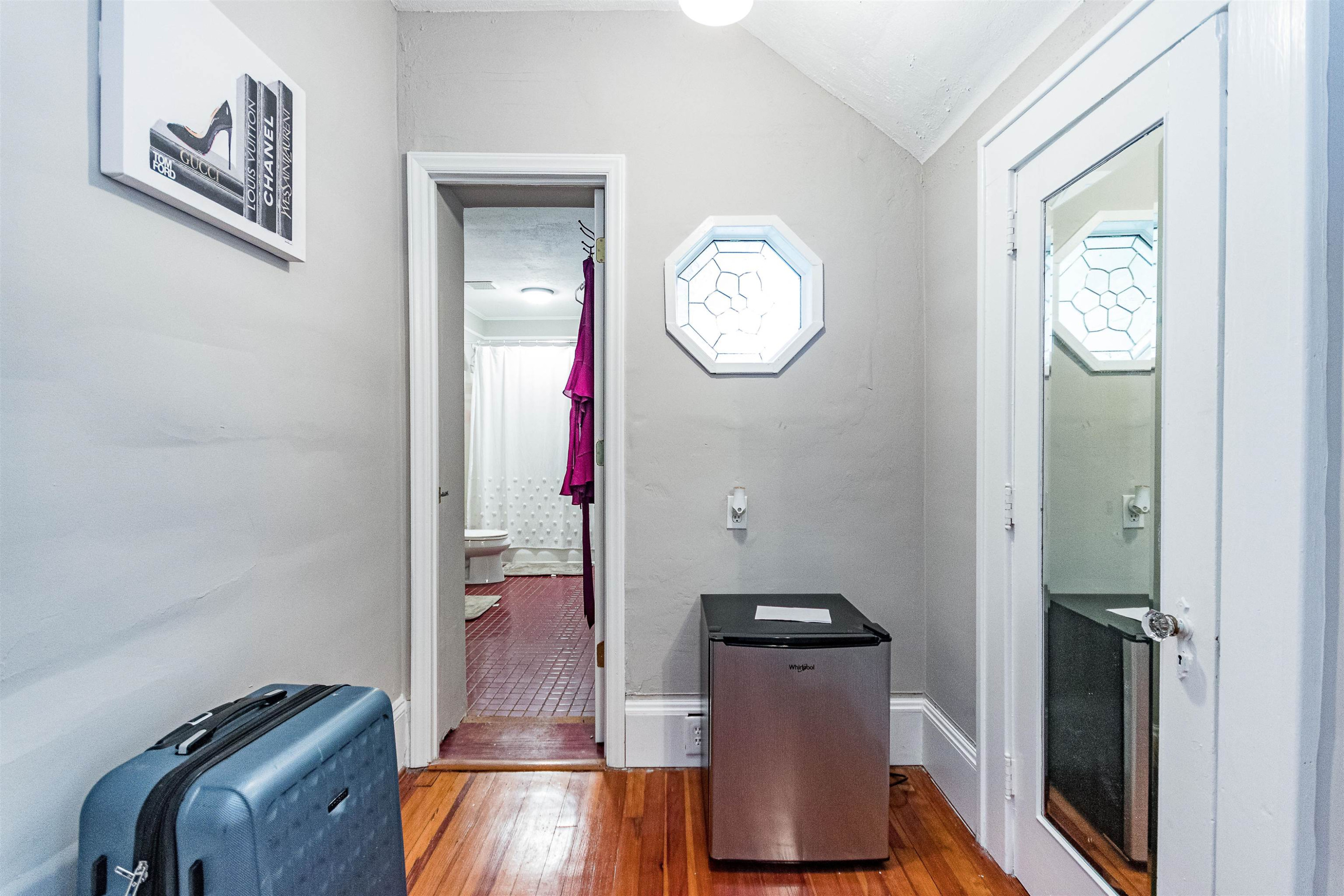 618 Brooks Avenue Raleigh, NC 27607 - Photo 17 of 27 a view of hallway with wooden floor