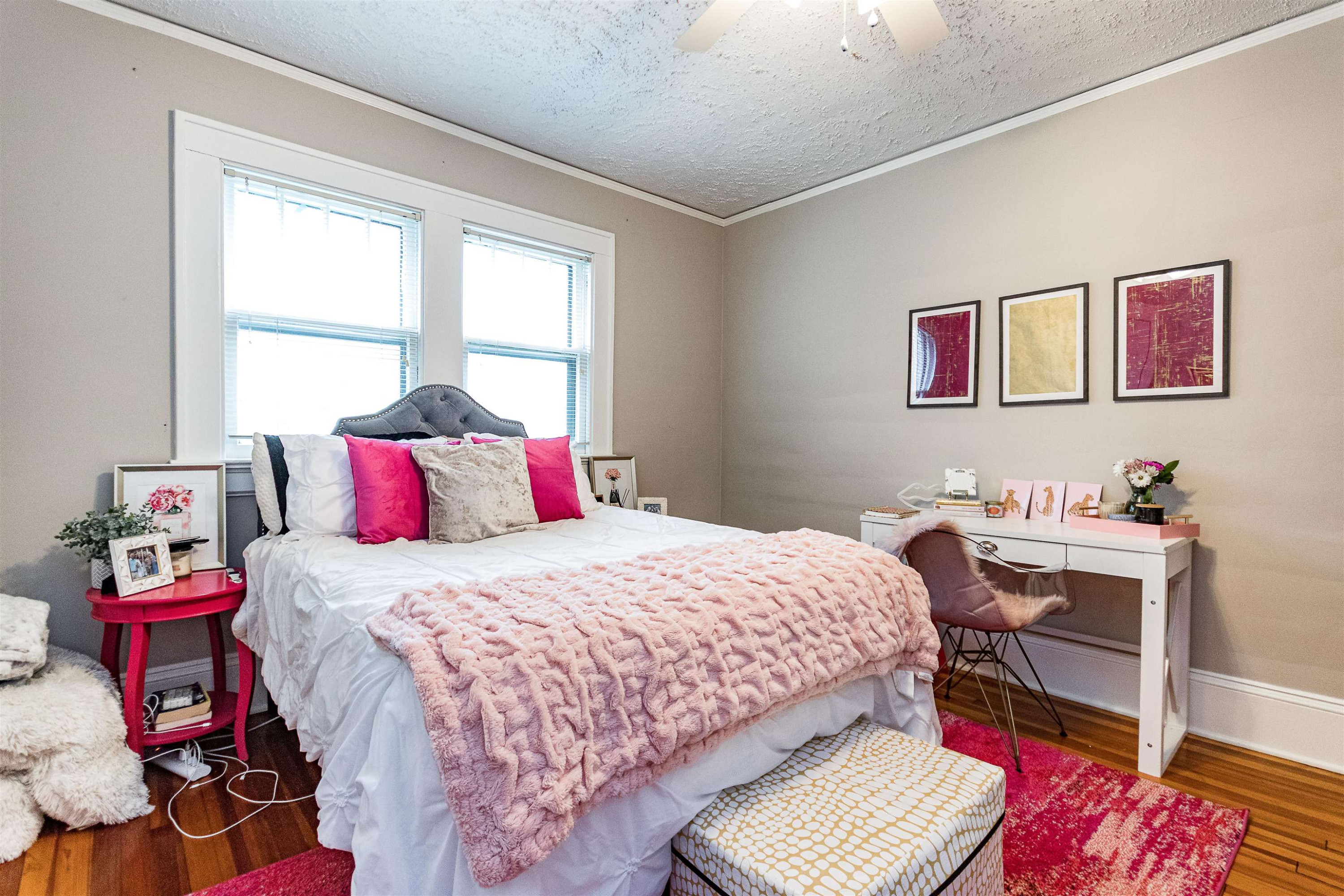 618 Brooks Avenue Raleigh, NC 27607 - Photo 19 of 27 a bedroom that has a bed and a desk in it