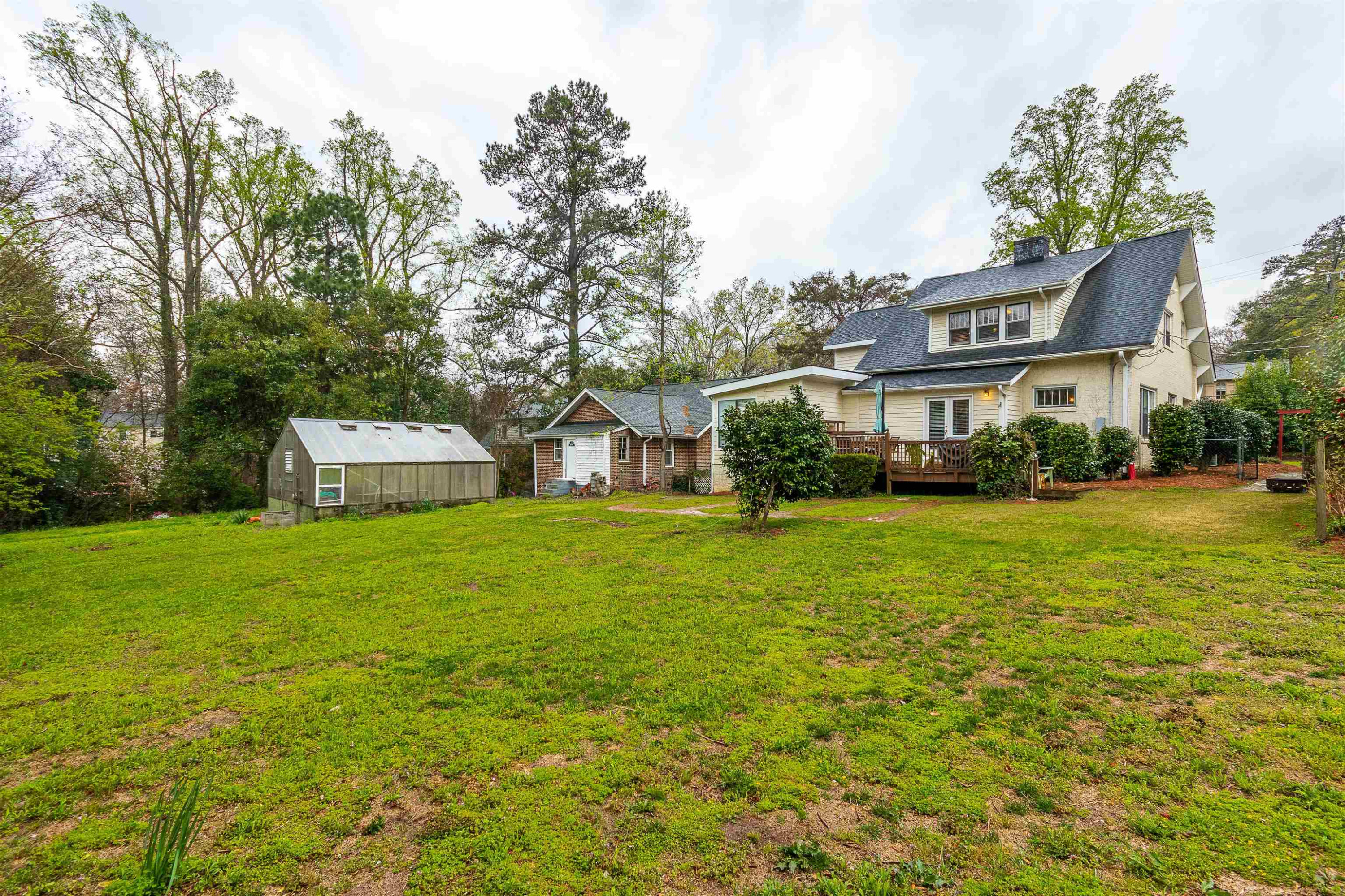 618 Brooks Avenue Raleigh, NC 27607 - Photo 25 of 27 a front view of a house with garden