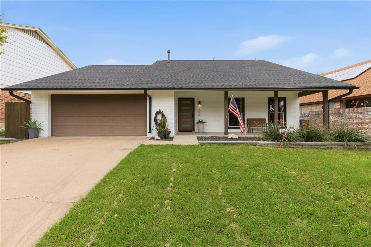 208 Skyloop Drive Austin, TX 78745 - Photo 1 of 34 Modernized South Austin curb appeal with fresh exterior paint, updated front entry, covered front porch, and mature landscaping.
