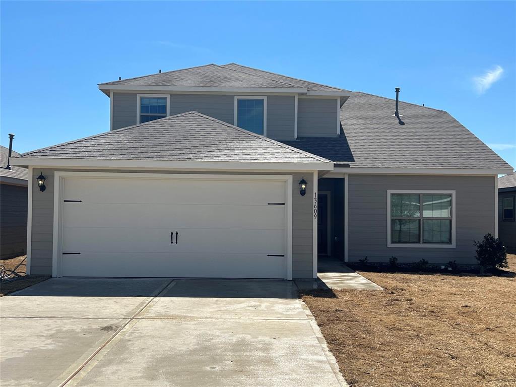 13609 Mineral Road Ponder, TX 76259 - Photo 1 of 21 Contemporary two-story exterior with gray siding