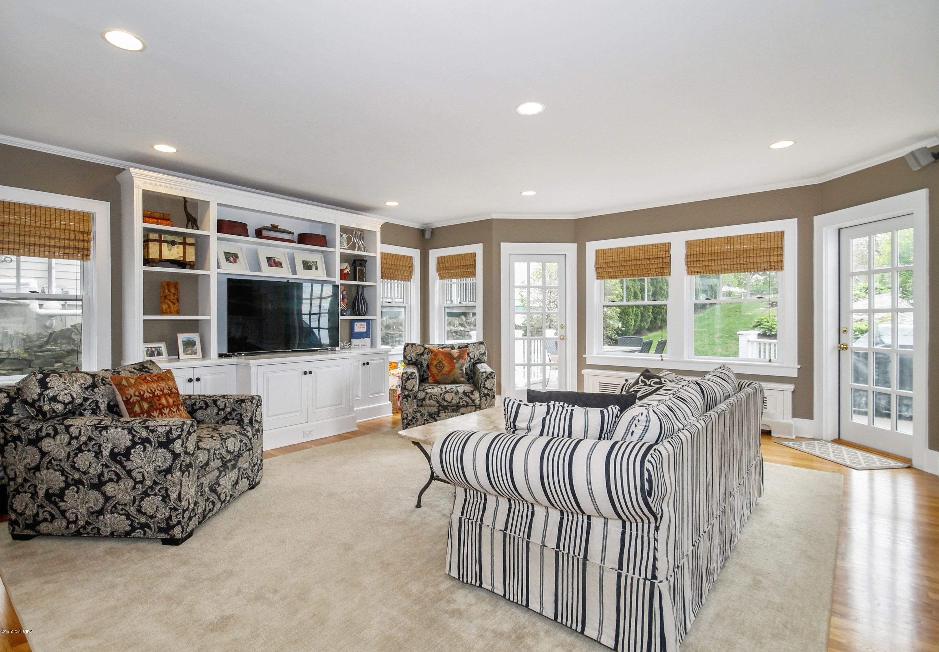 46 Orchard Place Greenwich, CT 06830 - Photo 12 of 34 a bed room with furniture and a flat screen tv