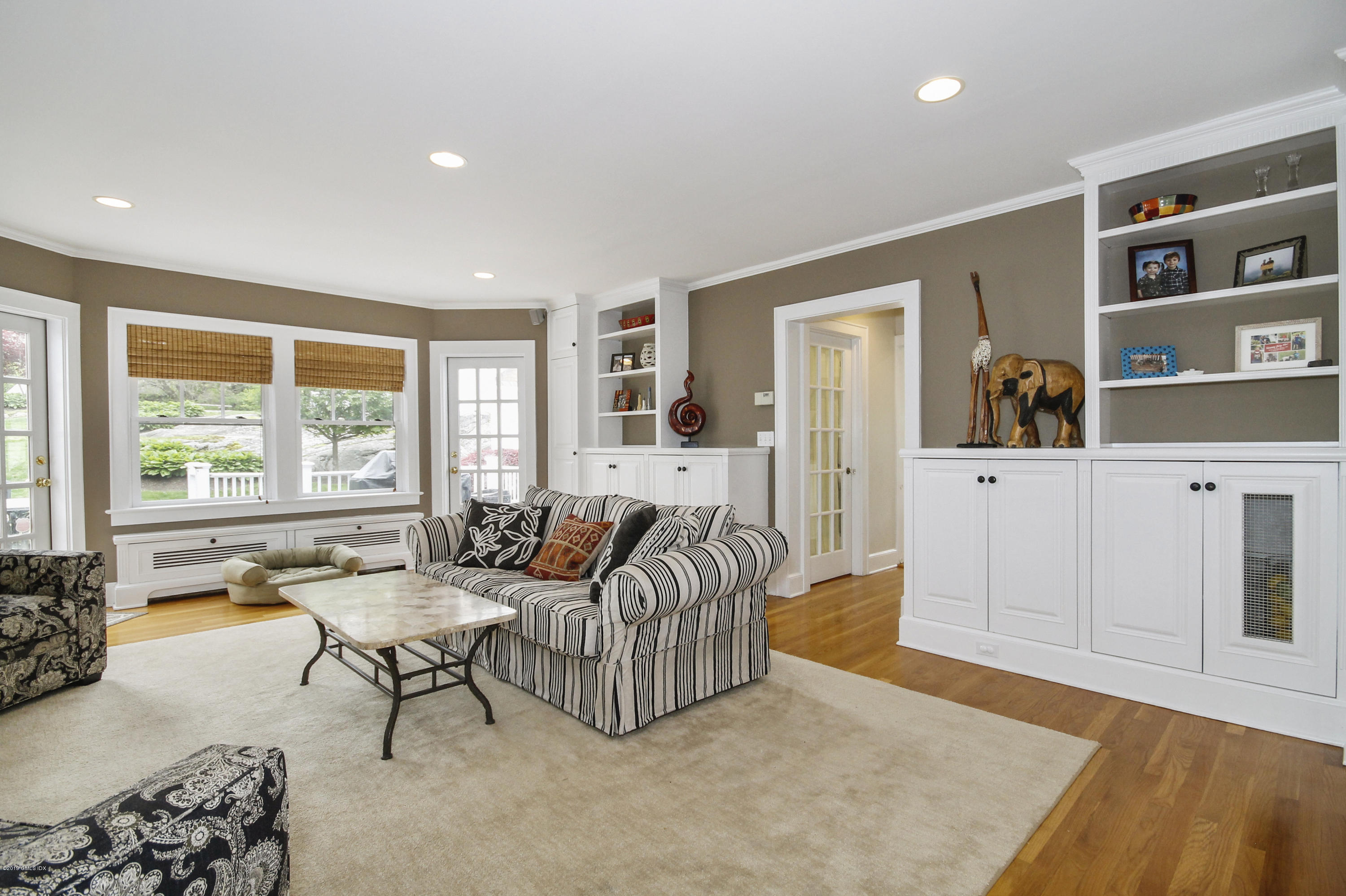 46 Orchard Place Greenwich, CT 06830 - Photo 14 of 34 a living room with furniture and a large window