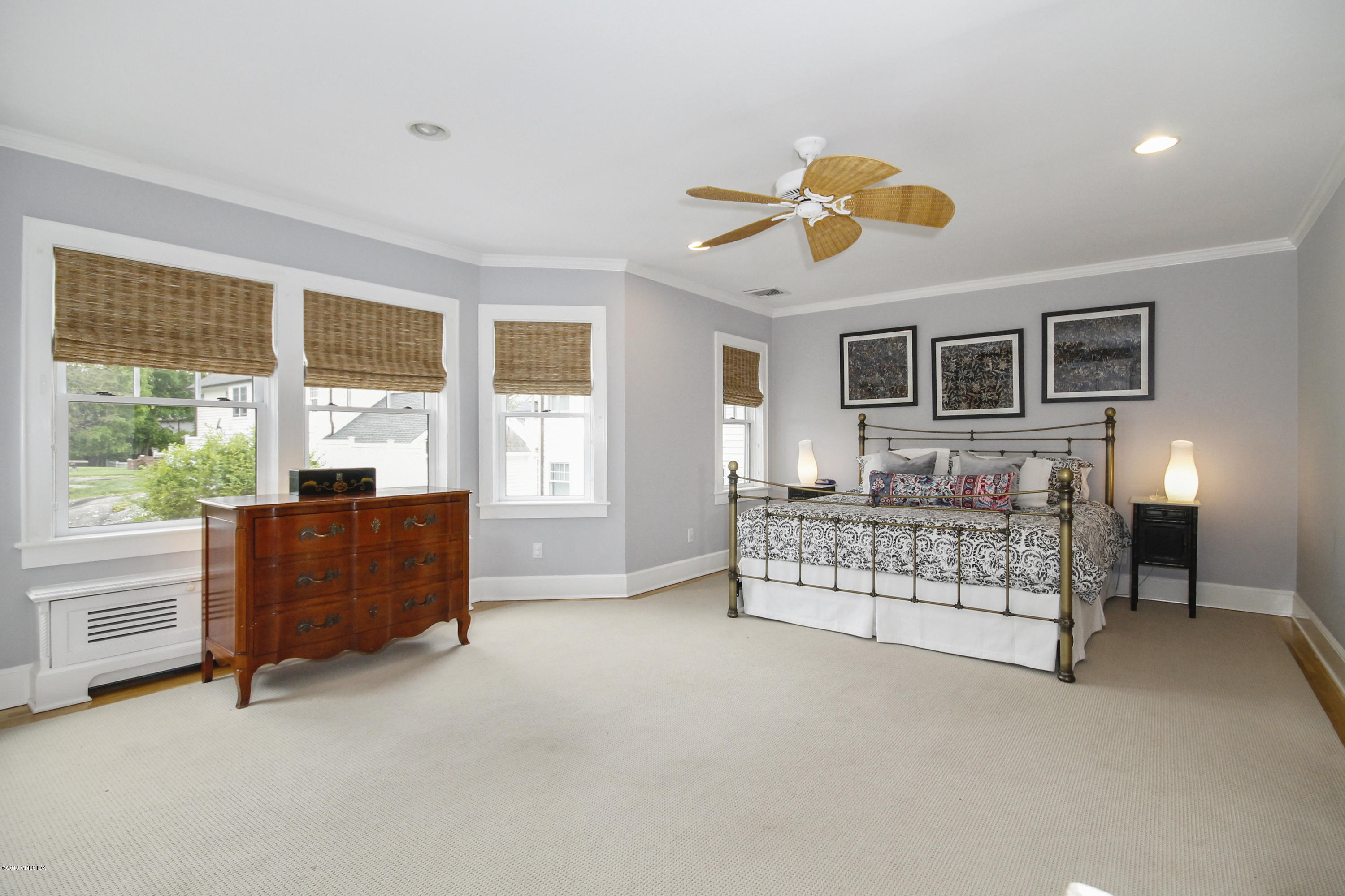 46 Orchard Place Greenwich, CT 06830 - Photo 20 of 34 a bed room with furniture and a window