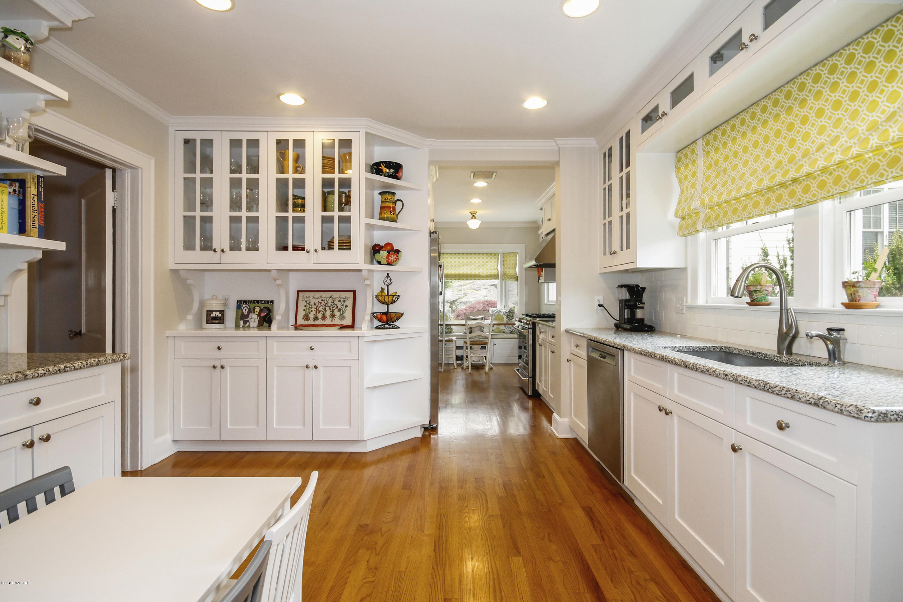 46 Orchard Place Greenwich, CT 06830 - Photo 8 of 34 a kitchen with stainless steel appliances granite countertop a stove and a cabinets