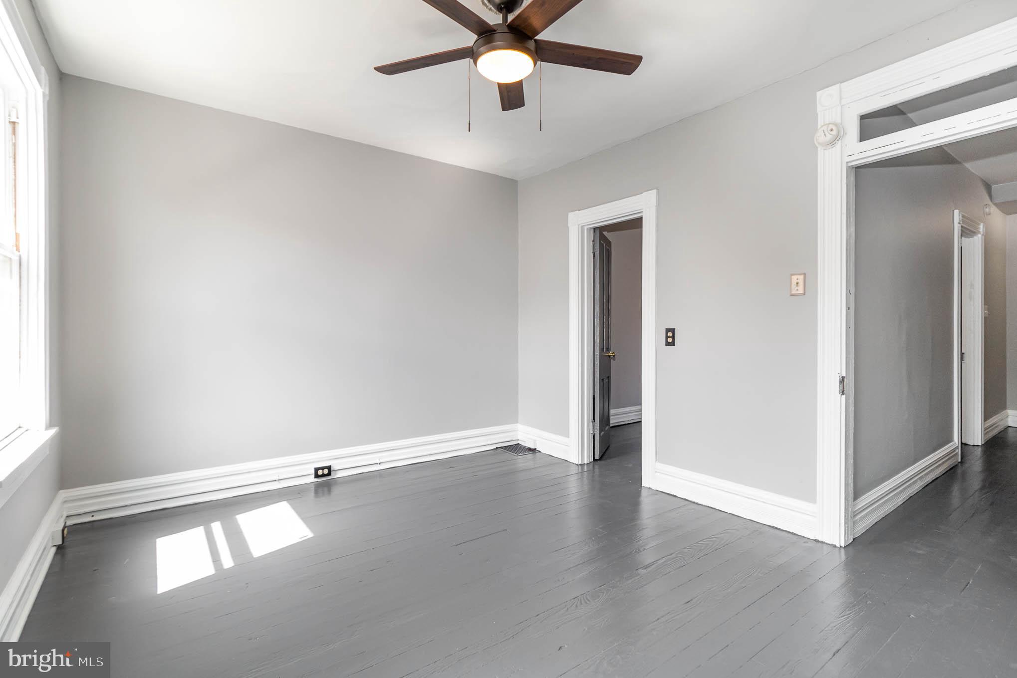 549 Spruce Street Lancaster, PA 17603 - Photo 20 of 29 wooden floor in an empty room with a window