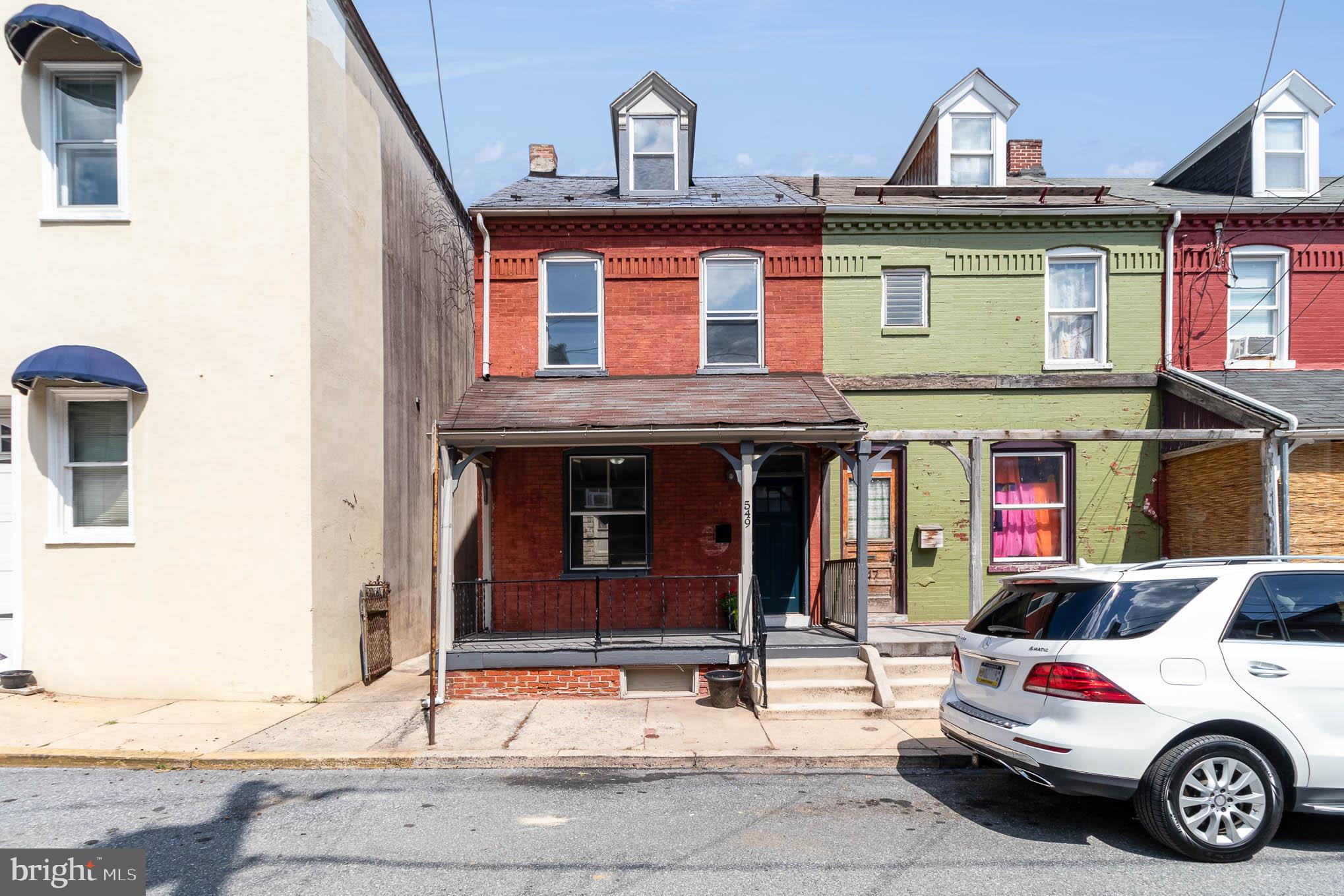 549 Spruce Street Lancaster, PA 17603 - Photo 2 of 29 a car parked in front of a house