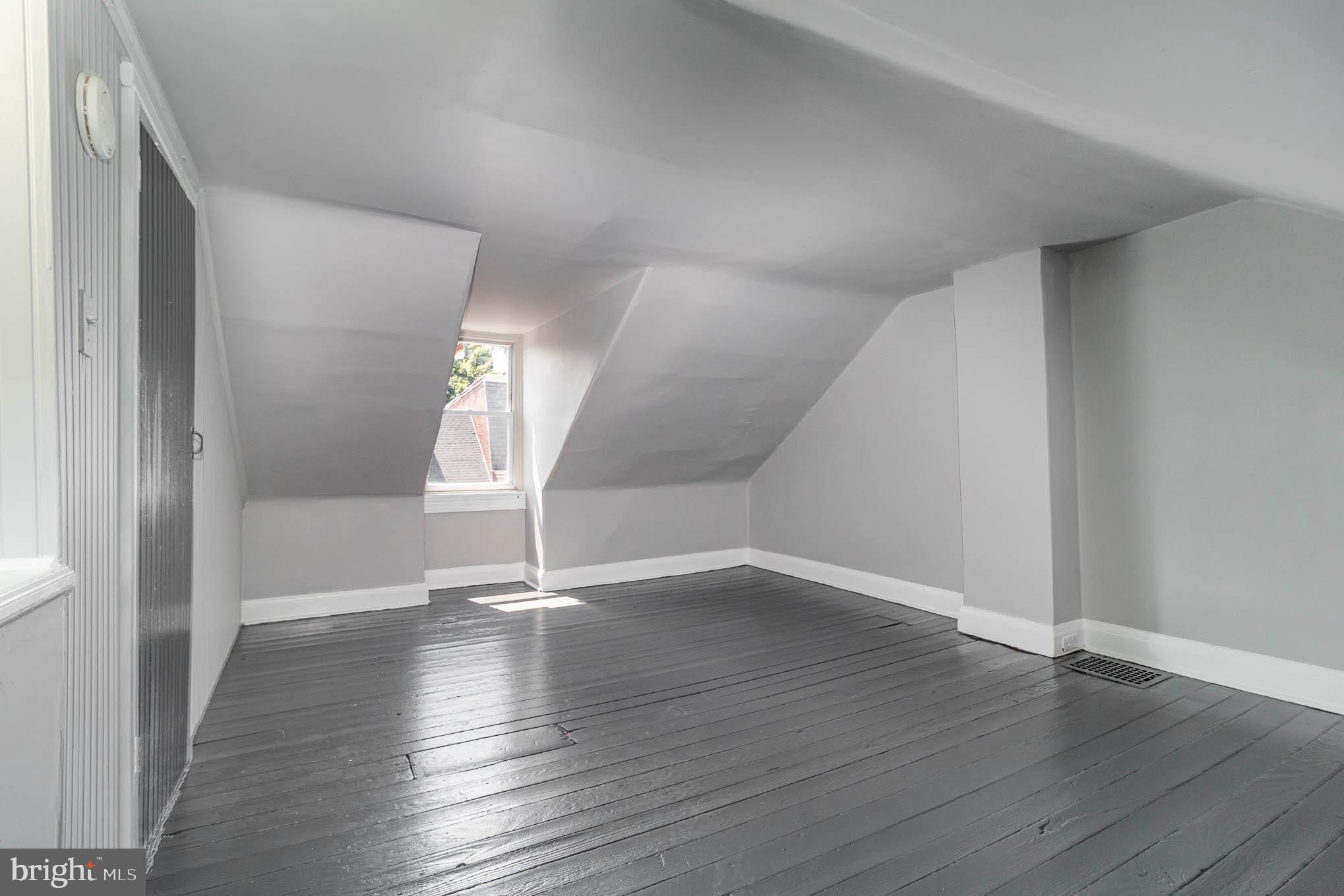 549 Spruce Street Lancaster, PA 17603 - Photo 21 of 29 a view of an empty room with wooden floor