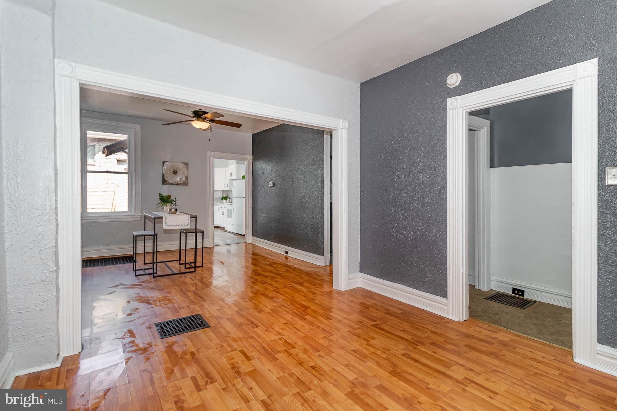 549 Spruce Street Lancaster, PA 17603 - Photo 4 of 29 a living room with furniture and a wooden floor