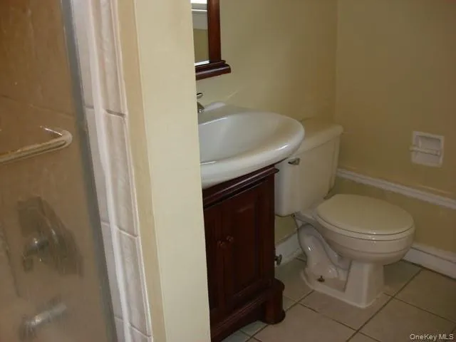 a bathroom with a sink and toilet