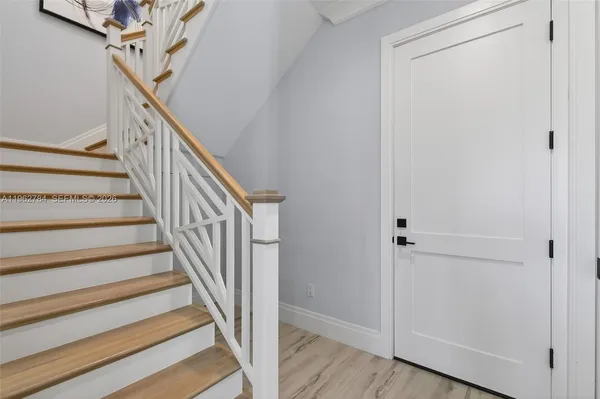 a view of a balcony with furniture
