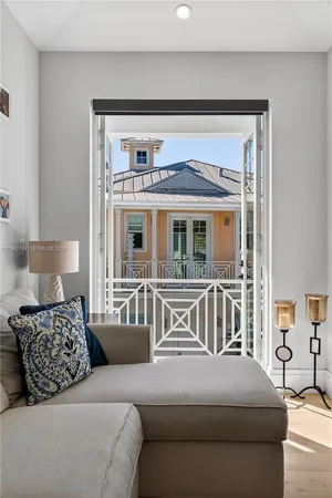a view of a balcony with chairs