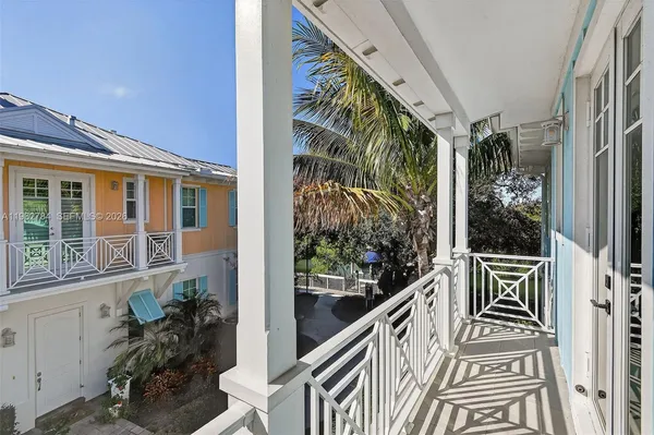 a view of a backyard with pathway