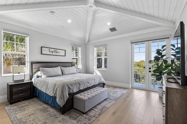 a view of a balcony with two chairs