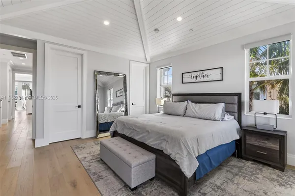 a view of a chair and table on the river