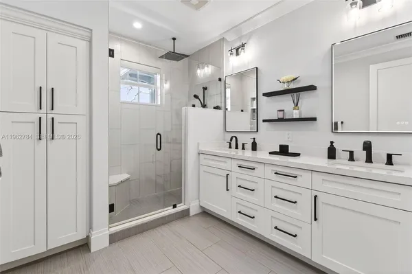 a view of a street with a building in the background