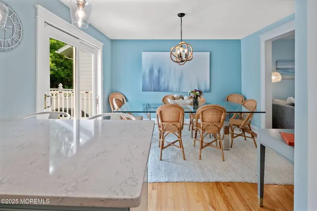 a kitchen with stainless steel appliances granite countertop a refrigerator a stove top oven a sink and dishwasher