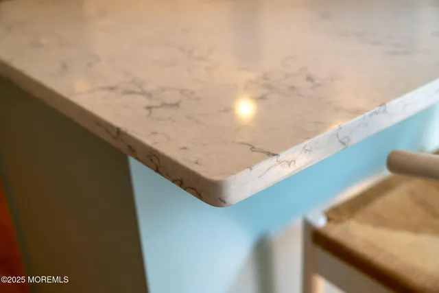 a kitchen with stainless steel appliances granite countertop a sink and stove top oven