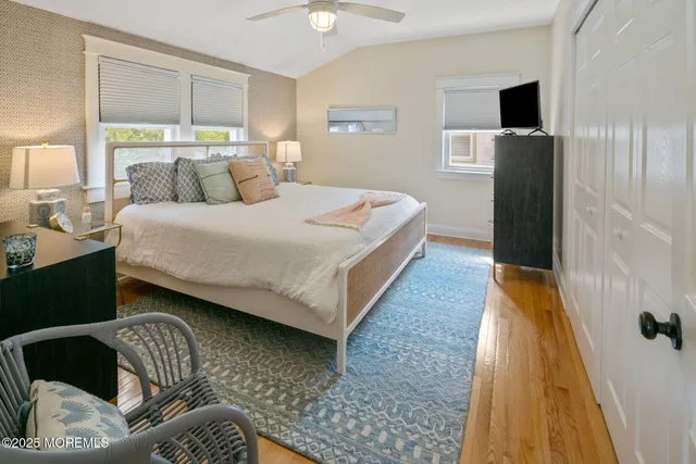 a very nice looking room with a white curtain and a window